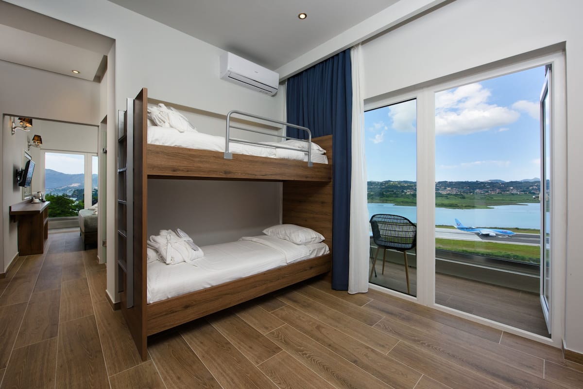 suite, sea view | minibar, in-room safe, desk, laptop workspace