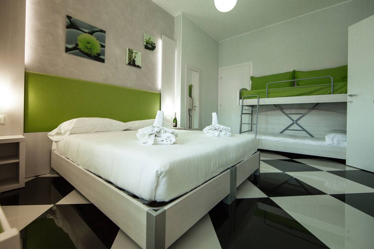Family Room | Hypo-allergenic bedding available, minibar, in-room safe, desk