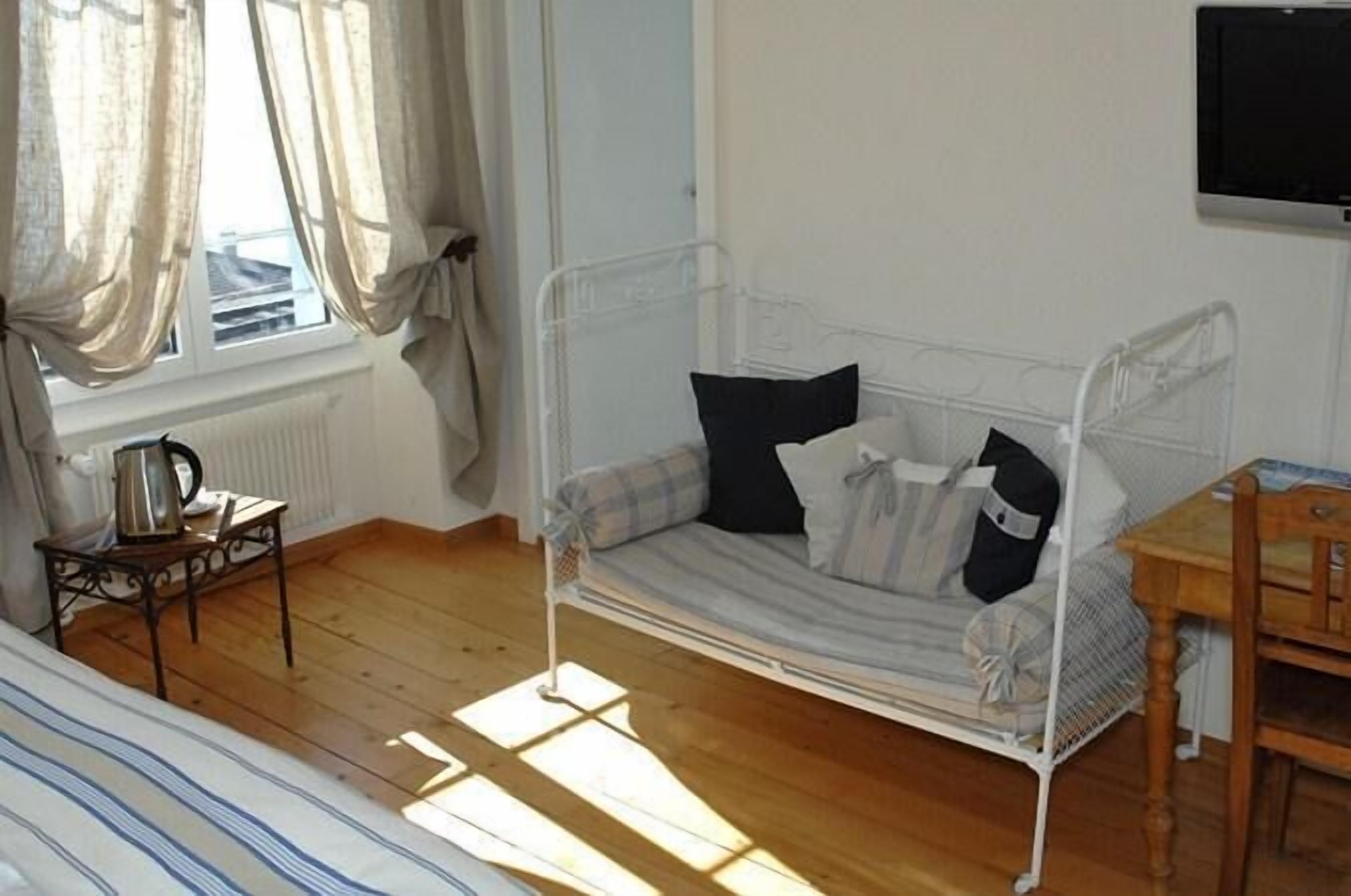 standard double room | living area | flat-screen tv