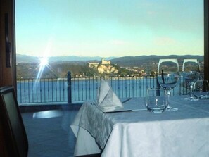 Breakfast, lunch, dinner served; Italian cuisine, garden views