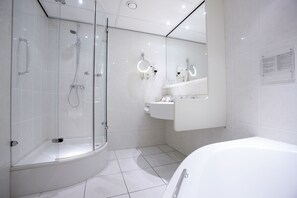 Separate bathtub and shower, jetted bath, hair dryer, bathrobes
