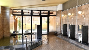 A public restroom with multiple sinks, a shower area, and a glass-enclosed entrance. - New Commander Hotel Osaka Neyagawa (Neyagawa)
