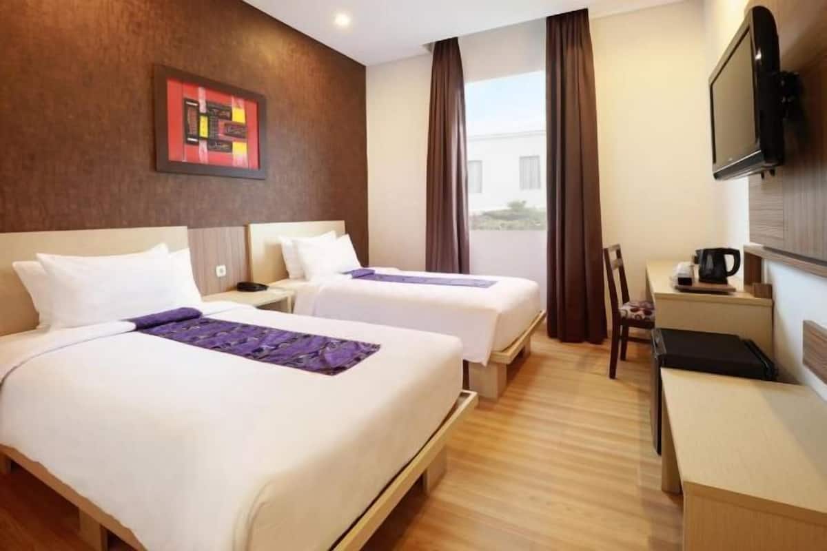Down comforters, memory foam beds, minibar, in-room safe