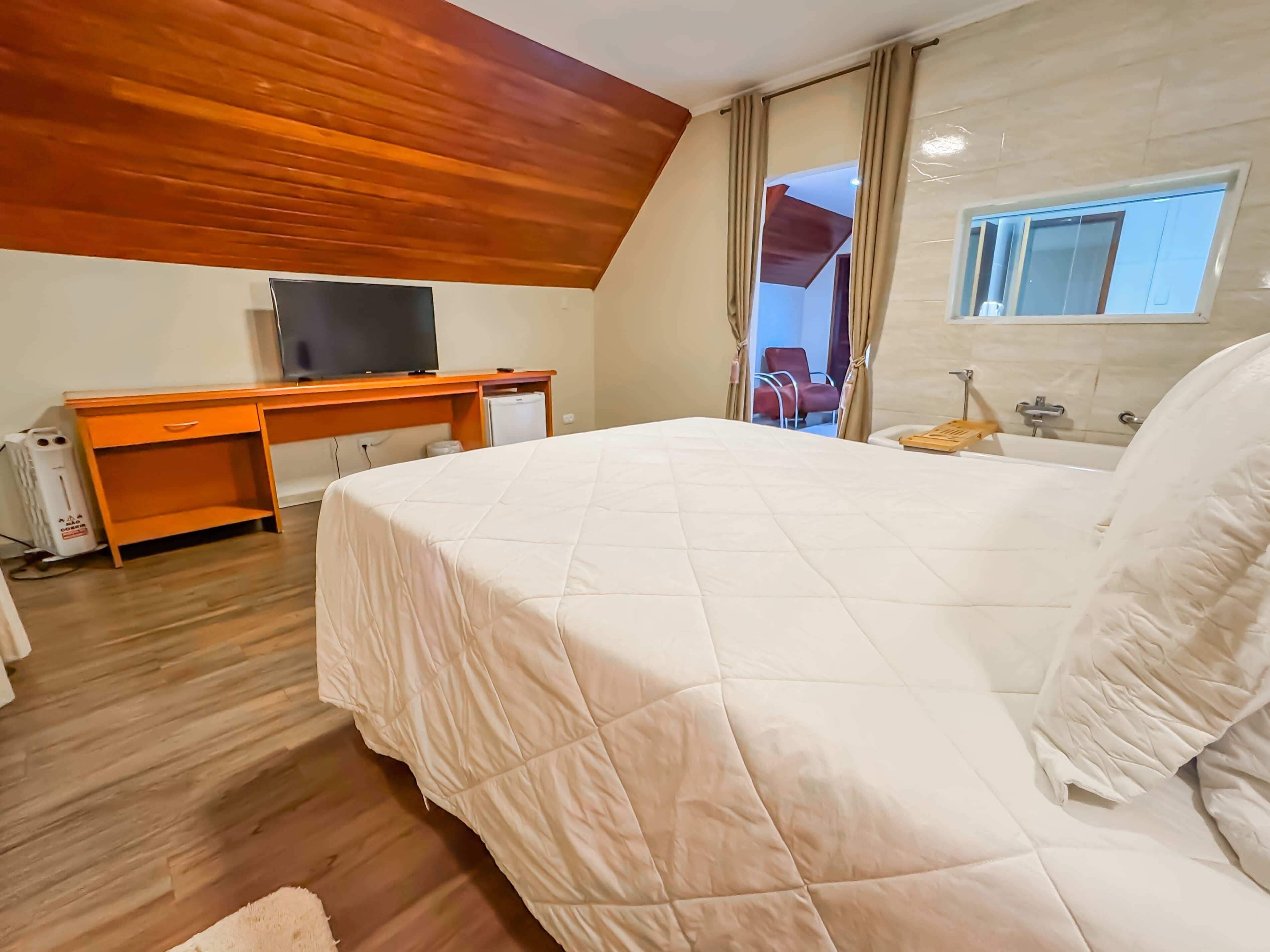 deluxe double room | blackout curtains, bed sheets