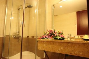 Shower, free toiletries, hair dryer, slippers