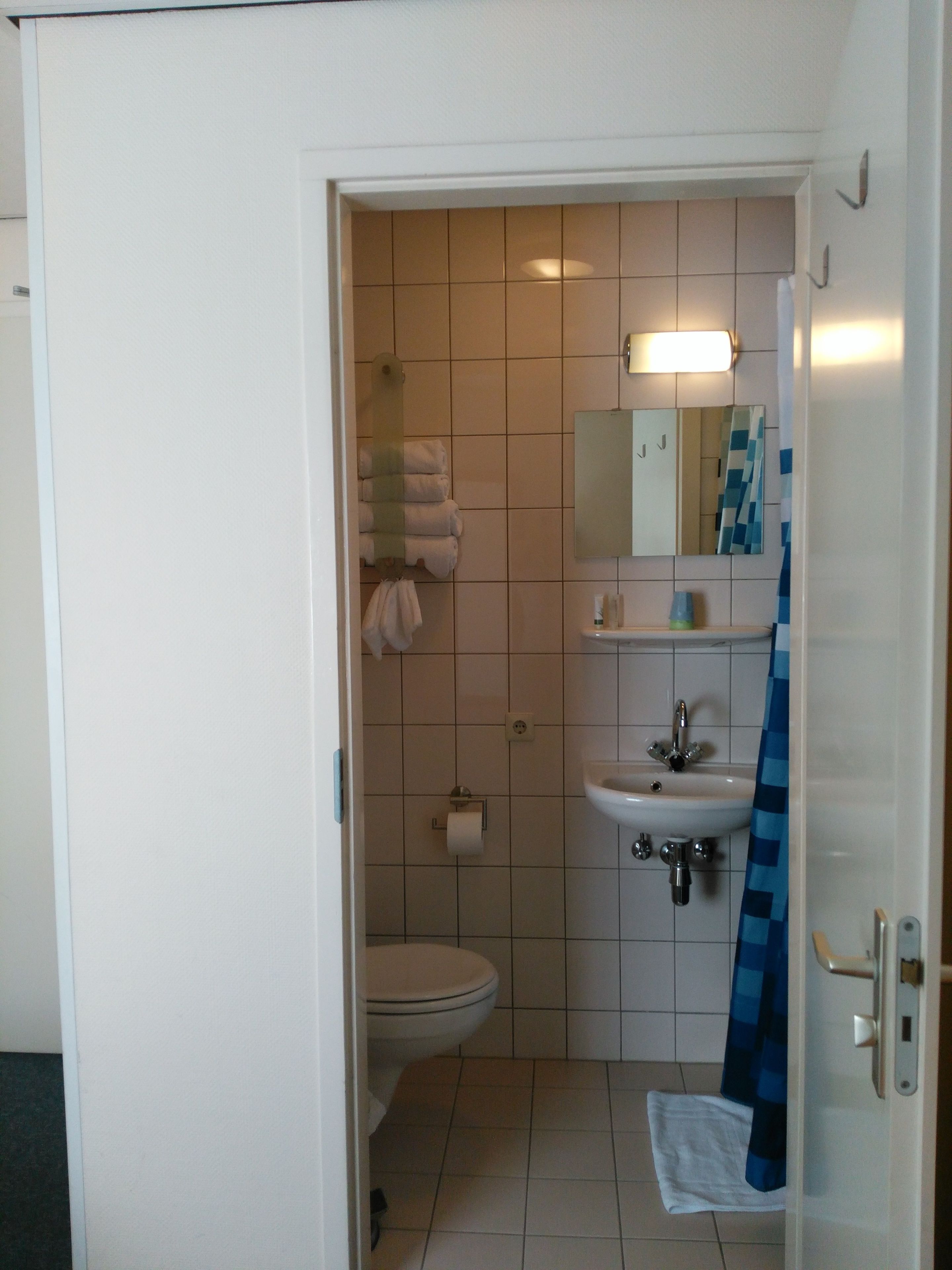 twin room (small) | bathroom | shower, hair dryer, towels