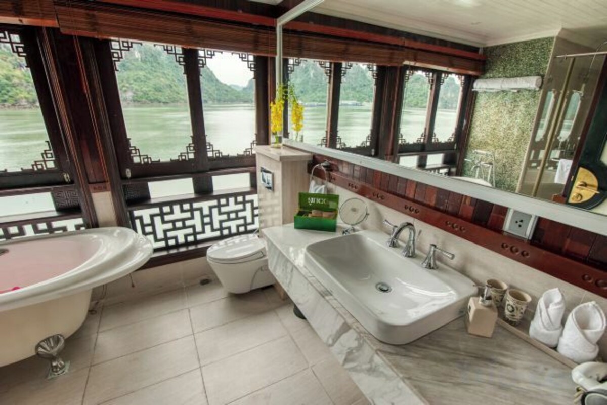 Bathroom | Designer toiletries, hair dryer, bathrobes, slippers