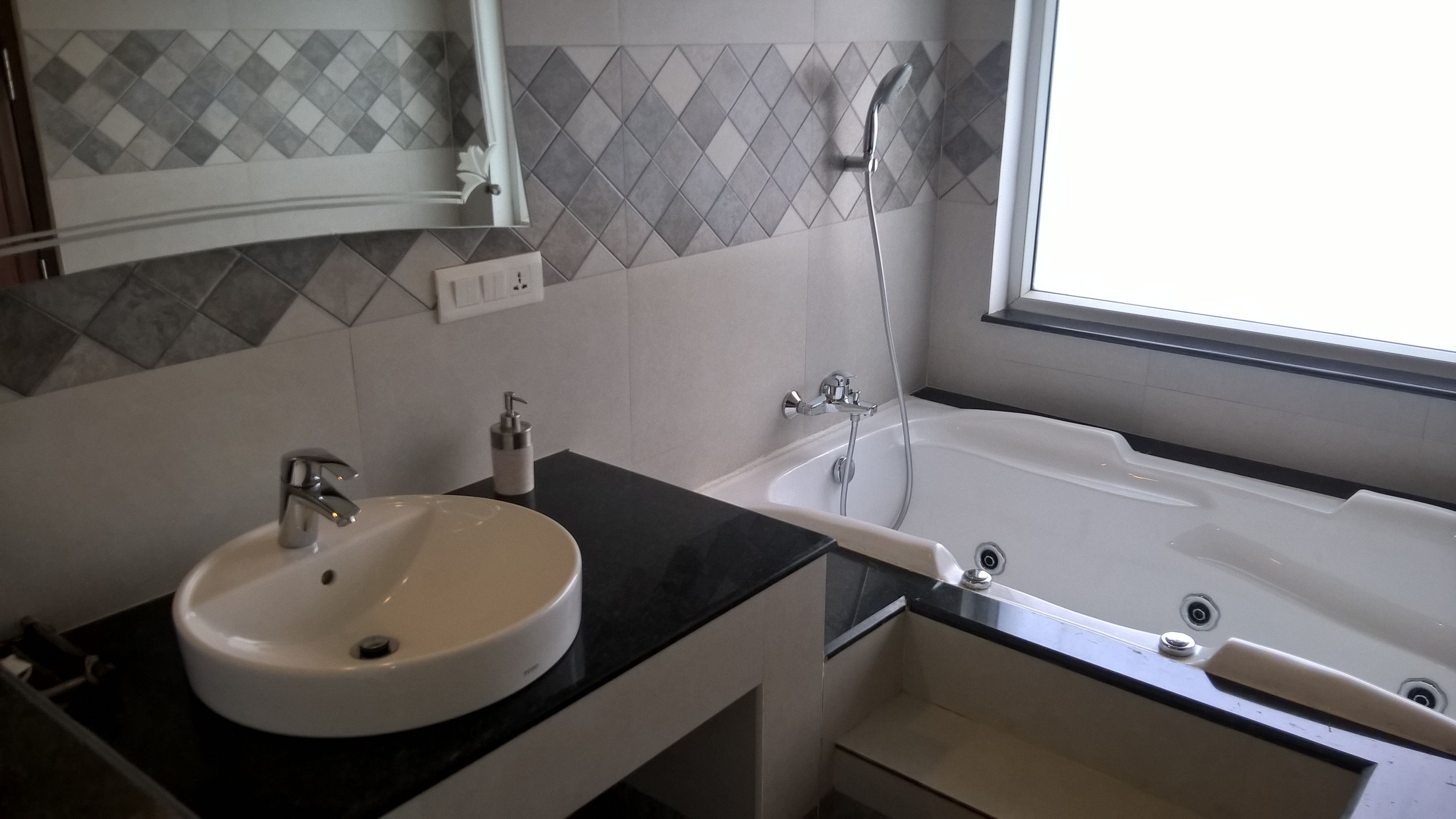 luxury suite, 1 bedroom, jetted tub, hill view | bathroom | free toiletries, hair dryer, slippers, towels