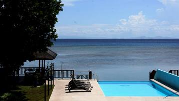 Outdoor pool, pool umbrellas, sun loungers