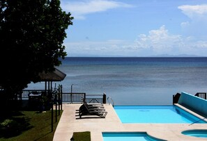 Outdoor pool, pool umbrellas, sun loungers