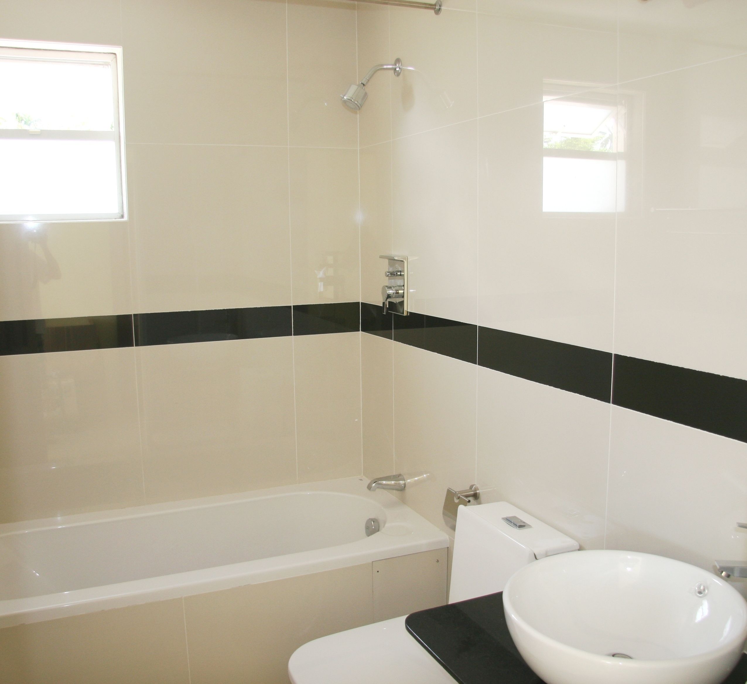 combined shower/bathtub, deep-soaking bathtub, designer toiletries