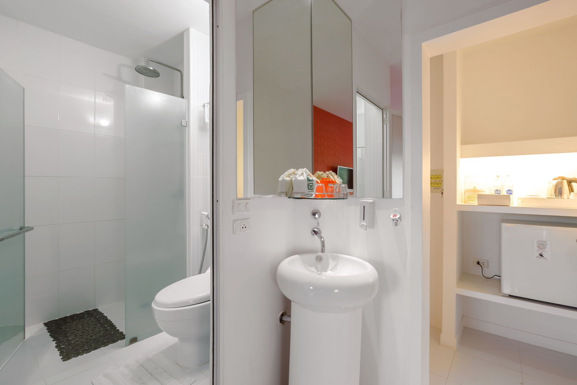 shower, designer toiletries, slippers, towels