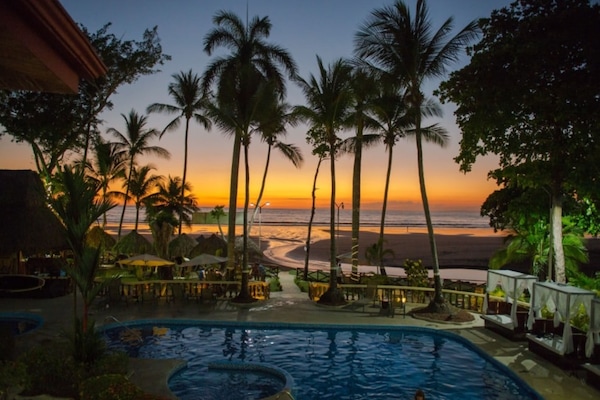 2 outdoor pools, open 6:30 AM to 10 PM, pool umbrellas, sun loungers