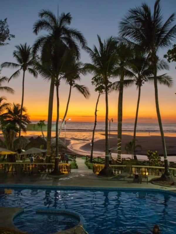 2 outdoor pools, open 6:30 AM to 10 PM, pool umbrellas, sun loungers