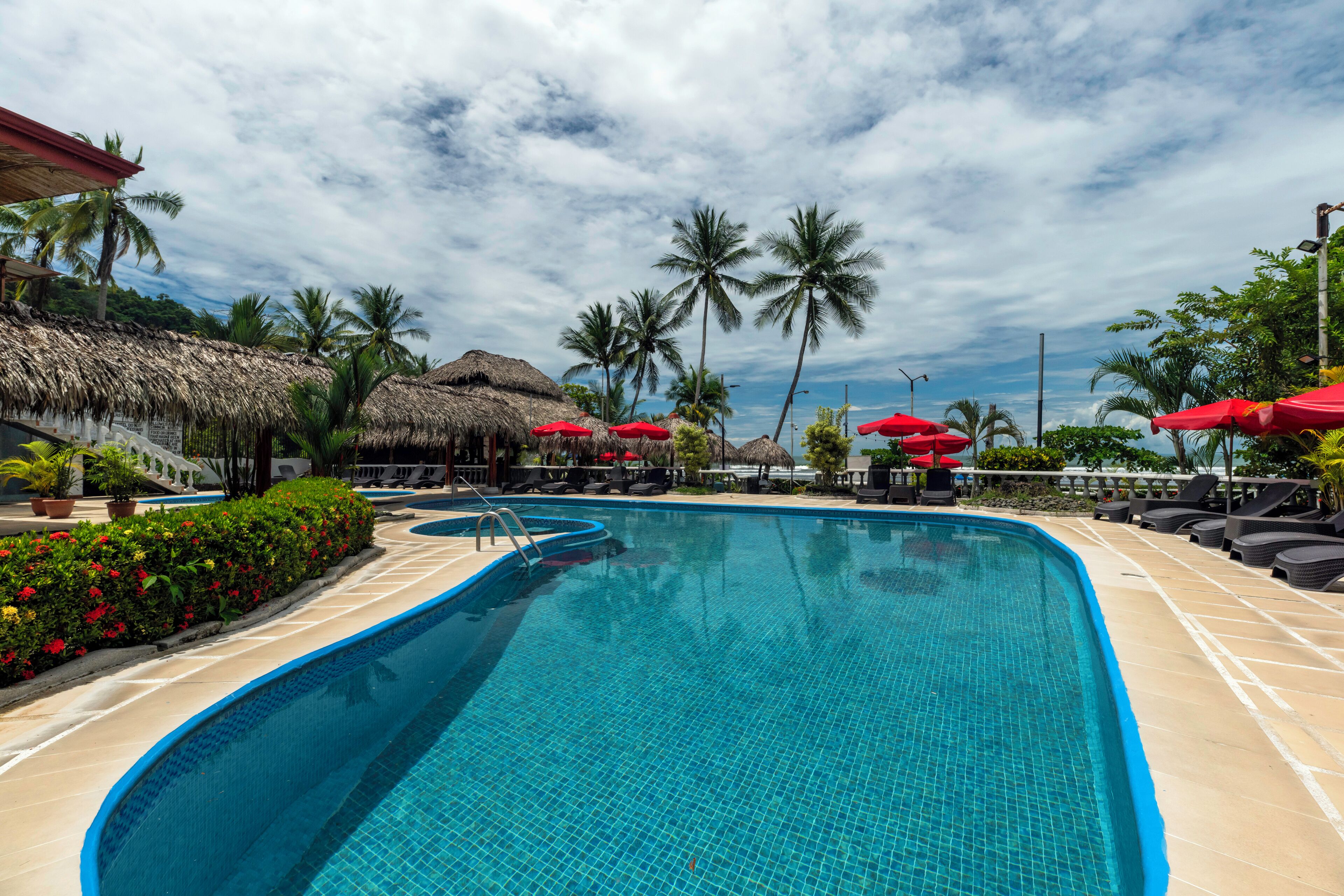 2 outdoor pools, open 6:30 am to 10 pm, pool umbrellas, pool loungers