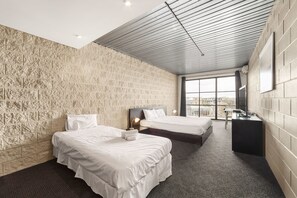 ห้องทวิน | เตารีด/โต๊ะรีดผ้า, Wi-Fi ฟรี, ผ้าปูที่นอน