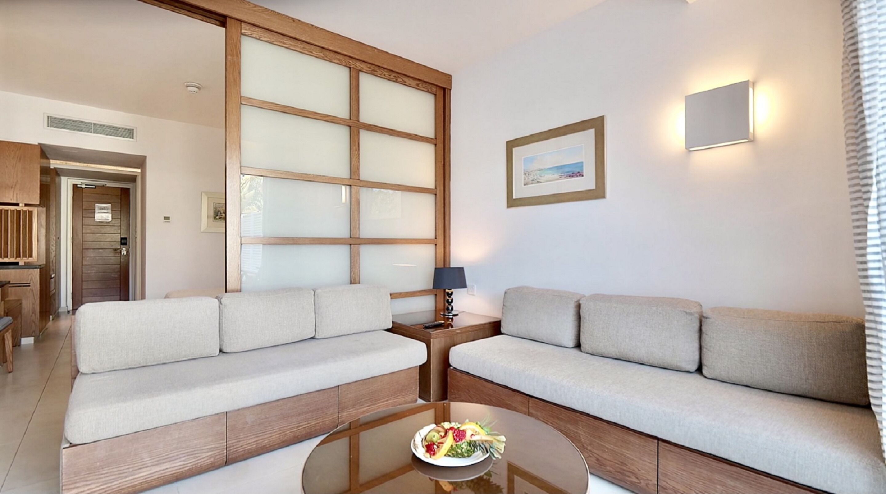 junior suite, garden view | living area | plasma tv