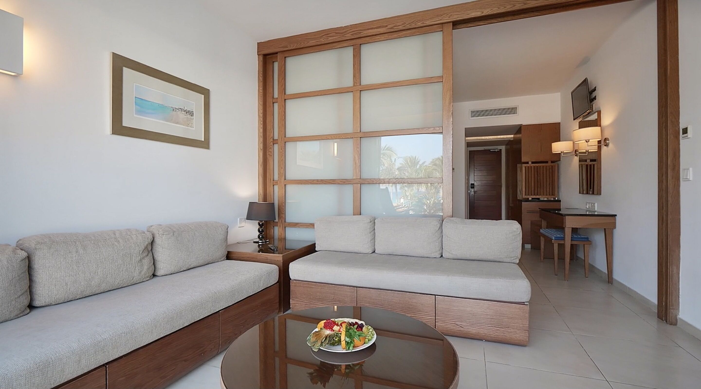 junior suite, pool access, sea view | living area | plasma tv