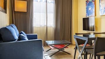 Televisión LCD de 32 pulgadas con canales por cable, una televisión