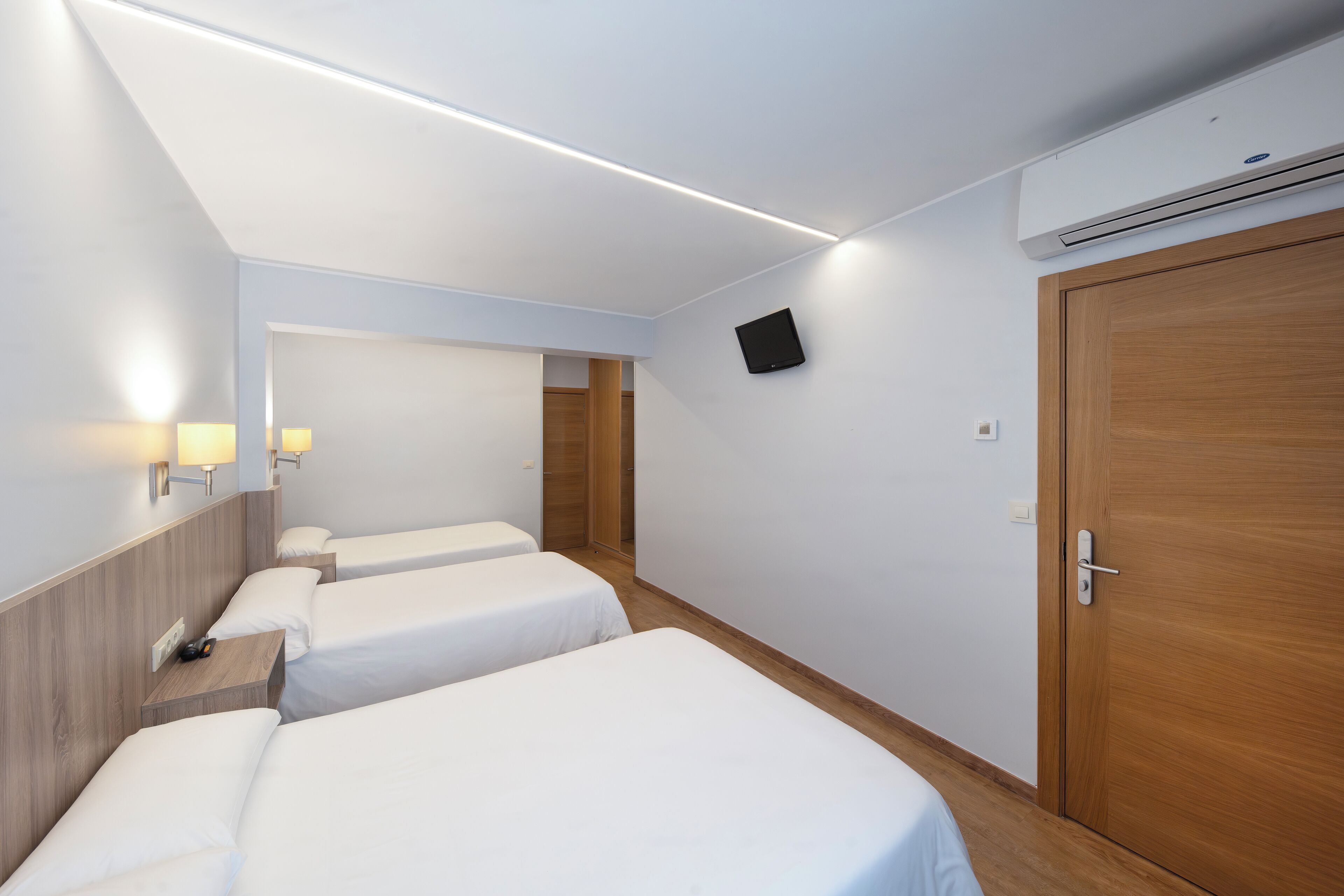 quadruple room | desk, laptop workspace, blackout curtains, iron/ironing board