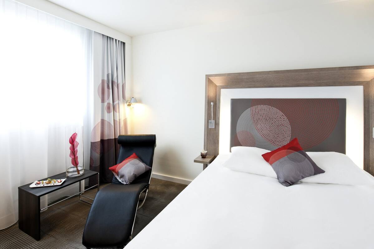 Habitación ejecutiva, 1 cama matrimonial | Ropa de cama de alta calidad, minibar, escritorio y cortinas blackout