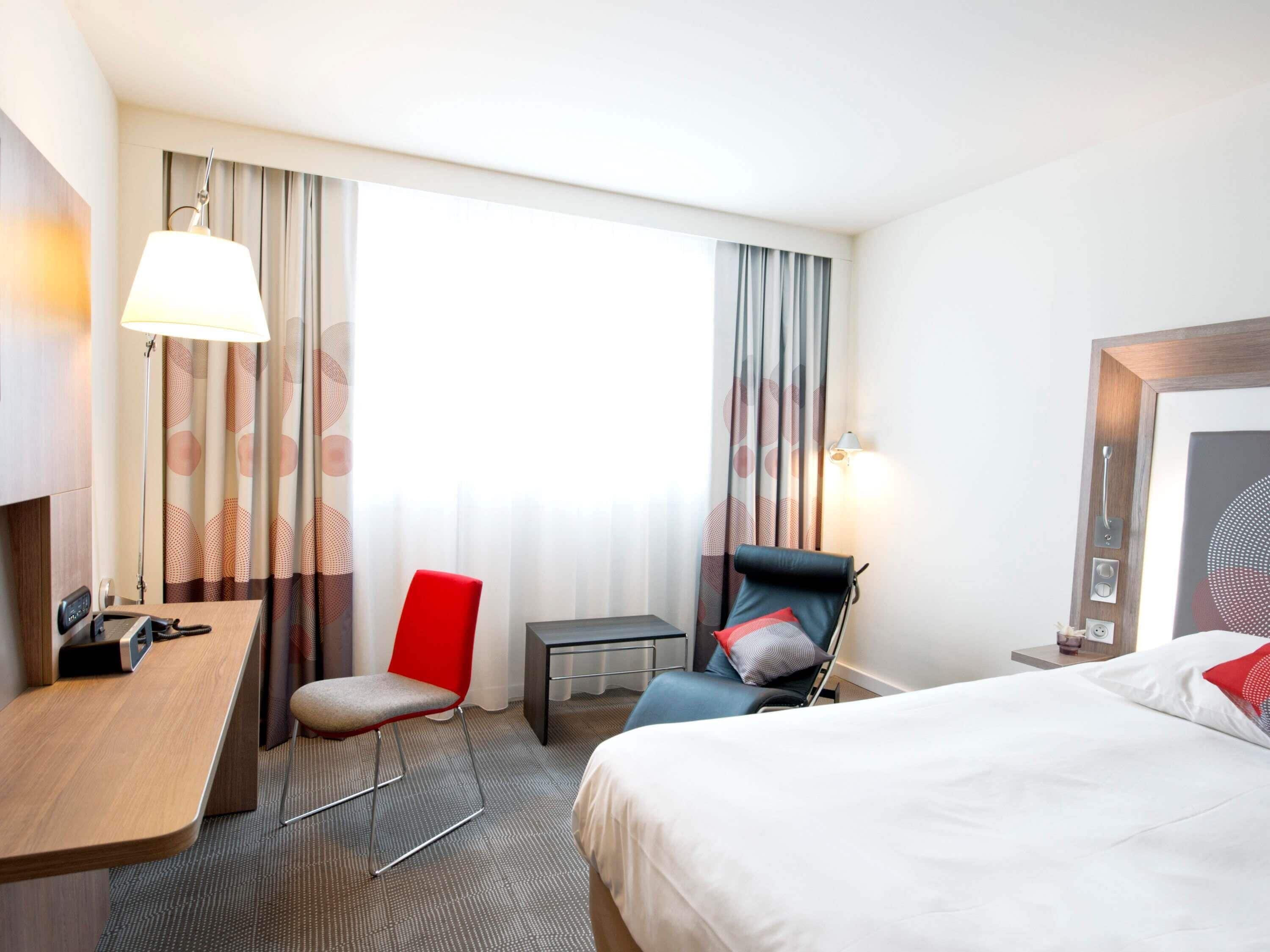 Ropa de cama de alta calidad, minibar, escritorio y cortinas blackout 