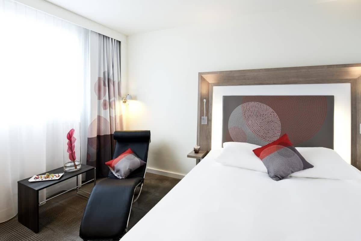 Habitación ejecutiva, 1 cama matrimonial | Ropa de cama de alta calidad, minibar, escritorio y cortinas blackout
