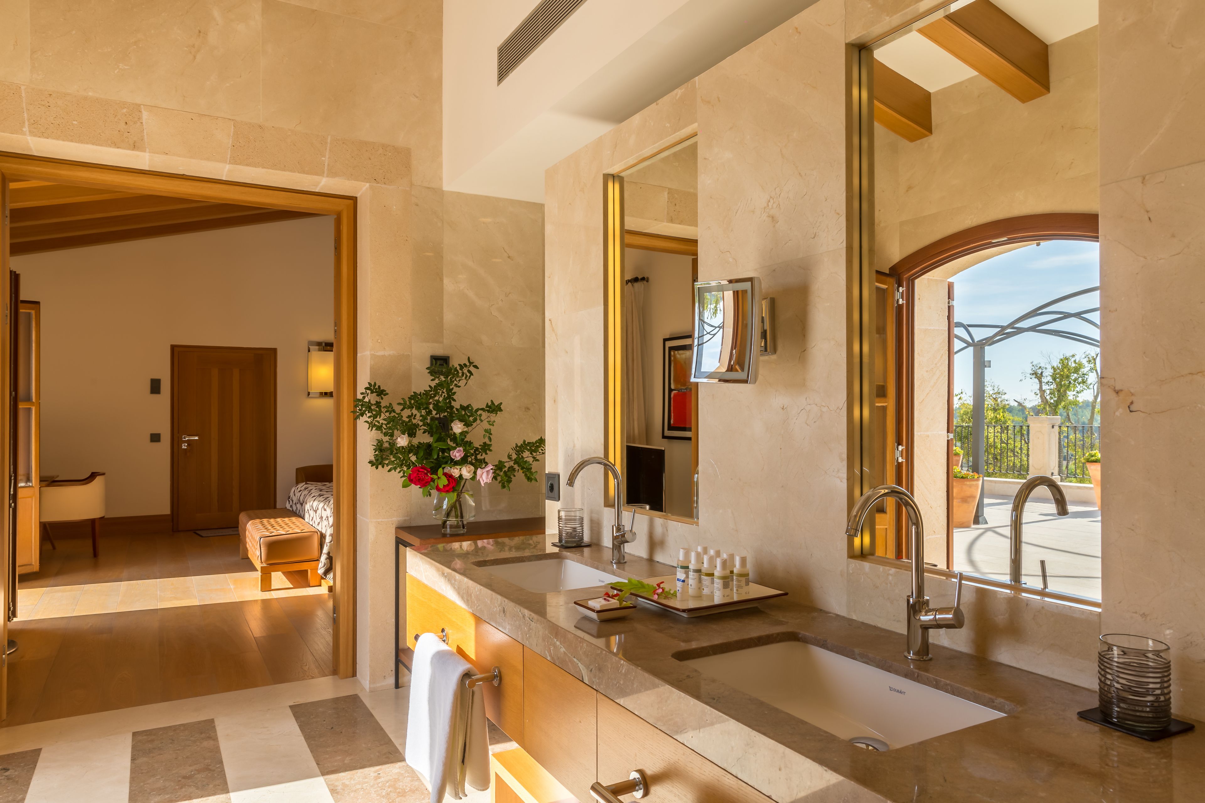 terrace demi suite | bathroom | rainfall showerhead, designer toiletries, hair dryer, bathrobes