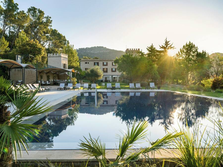 Indoor pool, outdoor pool, open 10:00 AM to 6:00 PM, pool umbrellas