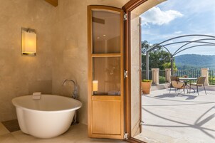 Rainfall showerhead, designer toiletries, hair dryer, bathrobes