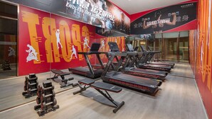 A gym with treadmills, dumbbells, and exercise equipment. - Ramada by Wyndham Changsha Financial Center (Changsha)
