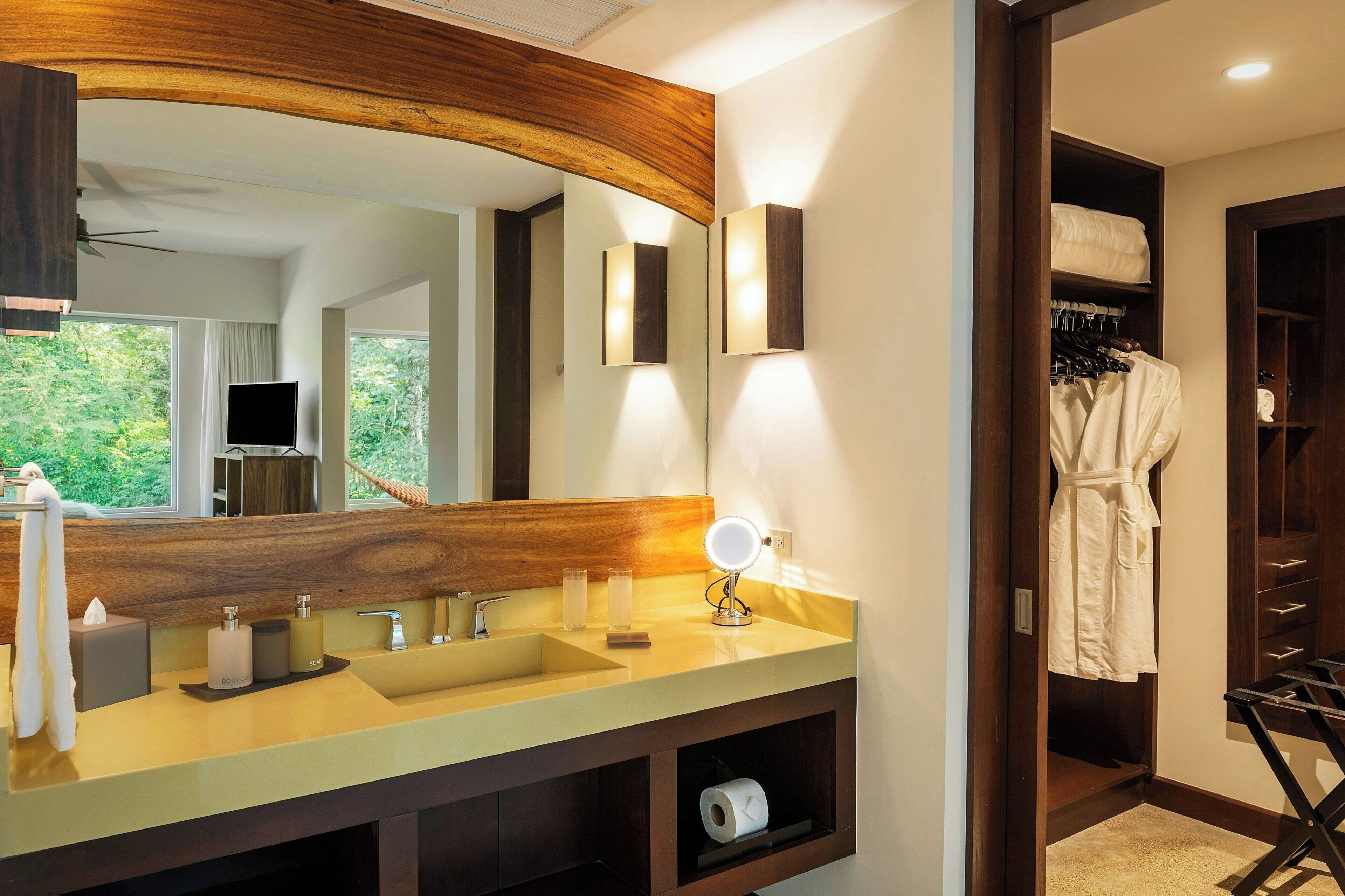 suite, 2 queen beds | bathroom | shower, rainfall showerhead, free toiletries, hair dryer