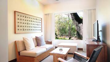 Superior Suite, 1 Bedroom, Balcony | Living room | 42-inch plasma TV with digital channels, TV, iPod dock