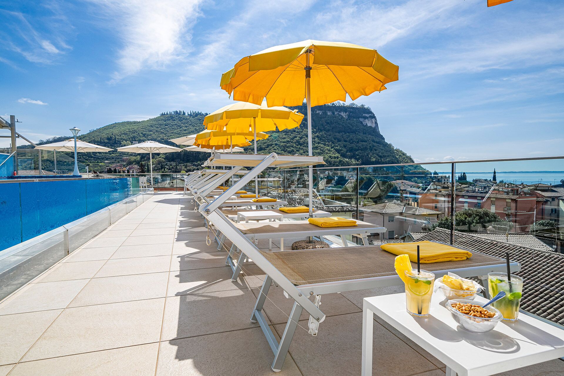 outdoor pool, pool umbrellas, pool loungers