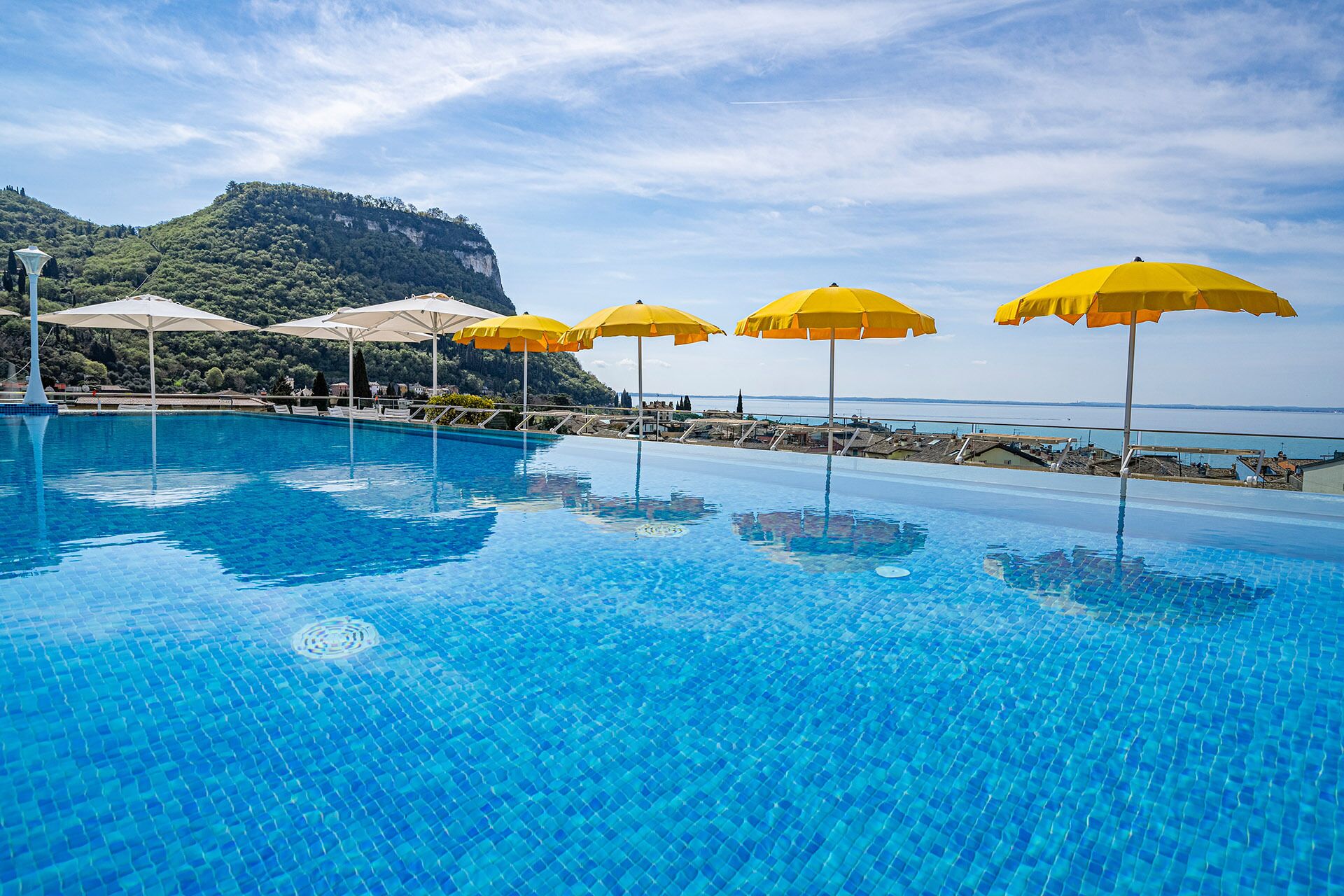 outdoor pool, pool umbrellas, pool loungers