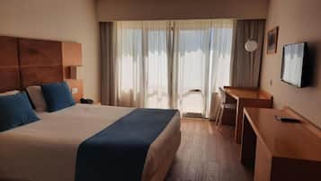 Desk, blackout drapes, soundproofing, free cribs/infant beds