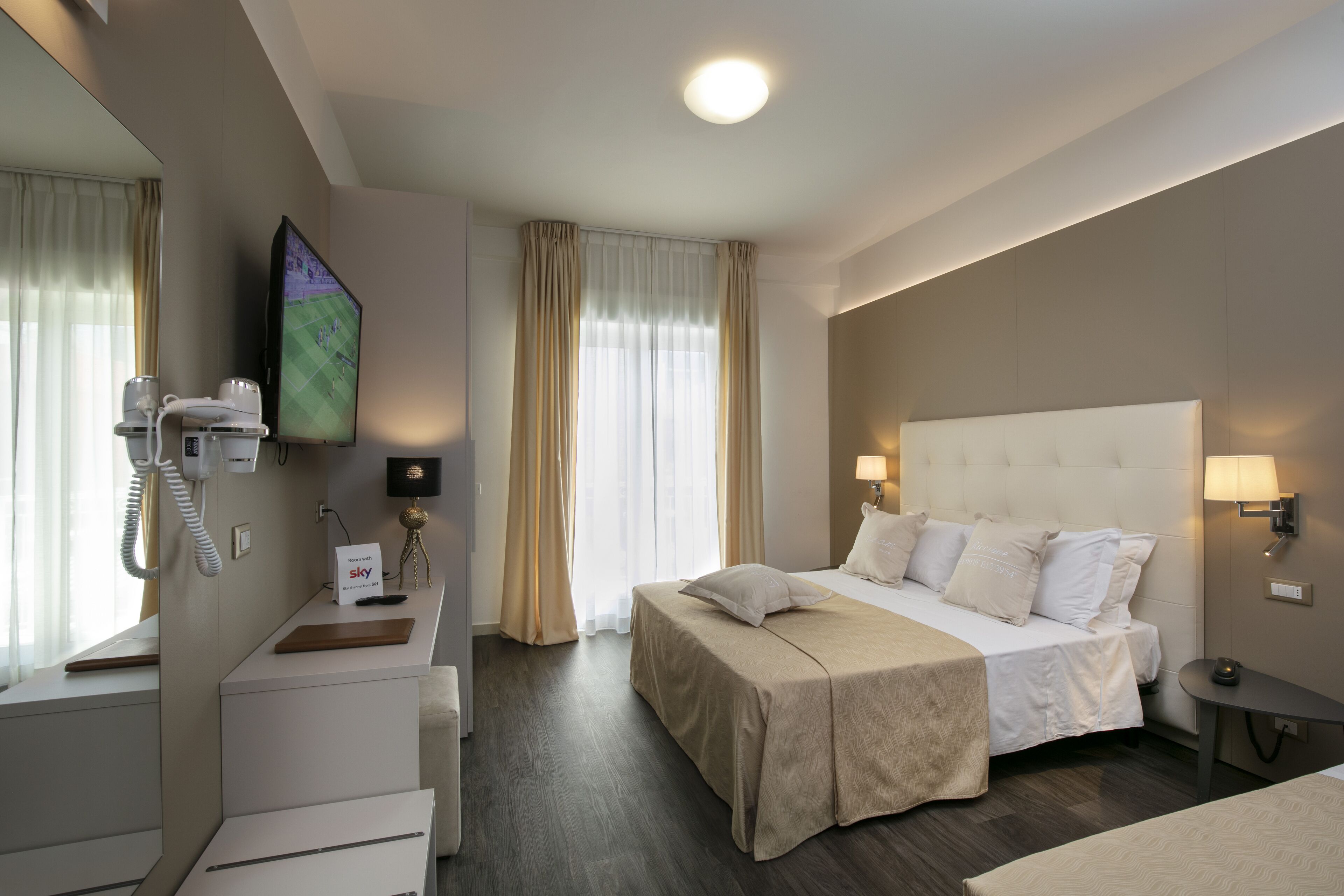 superior triple room, partial sea view | in-room safe, soundproofing, travel cot, free wifi