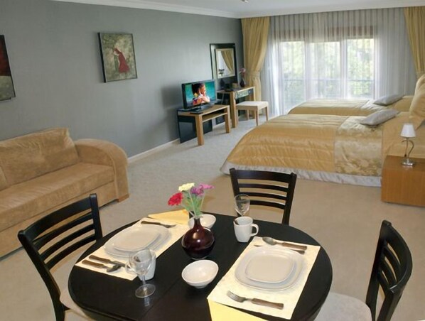 Deluxe Apartment, Garden View | Down comforters, blackout drapes, free WiFi