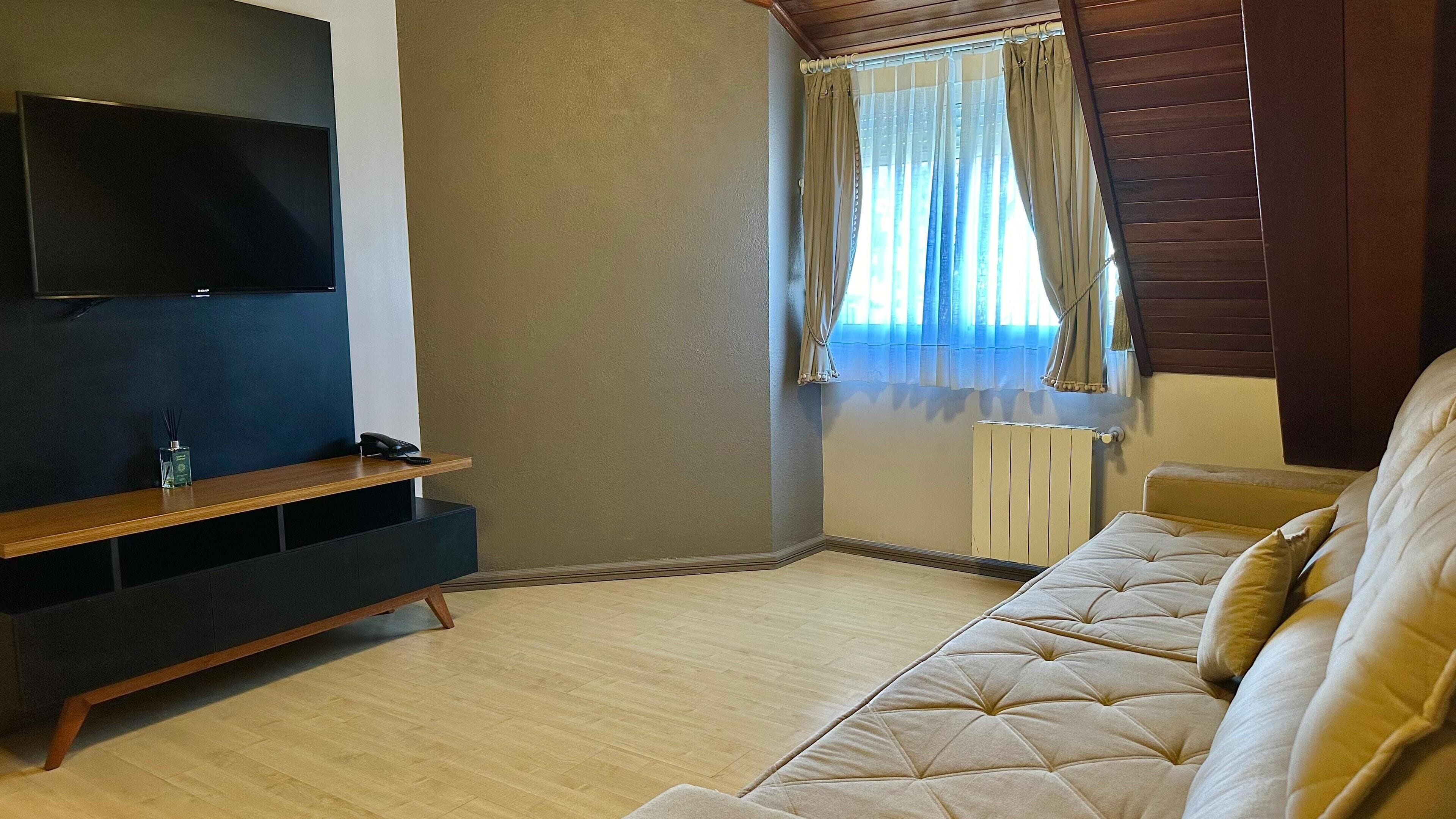 luxury room, 2 bedrooms, kitchen | living area | 32-inch lcd tv with digital channels, tv