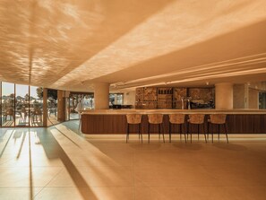 3 bars/lounges, poolside bar, beach bar