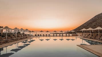 2 outdoor pools, open 8:00 AM to 6:00 PM, pool umbrellas, pool loungers