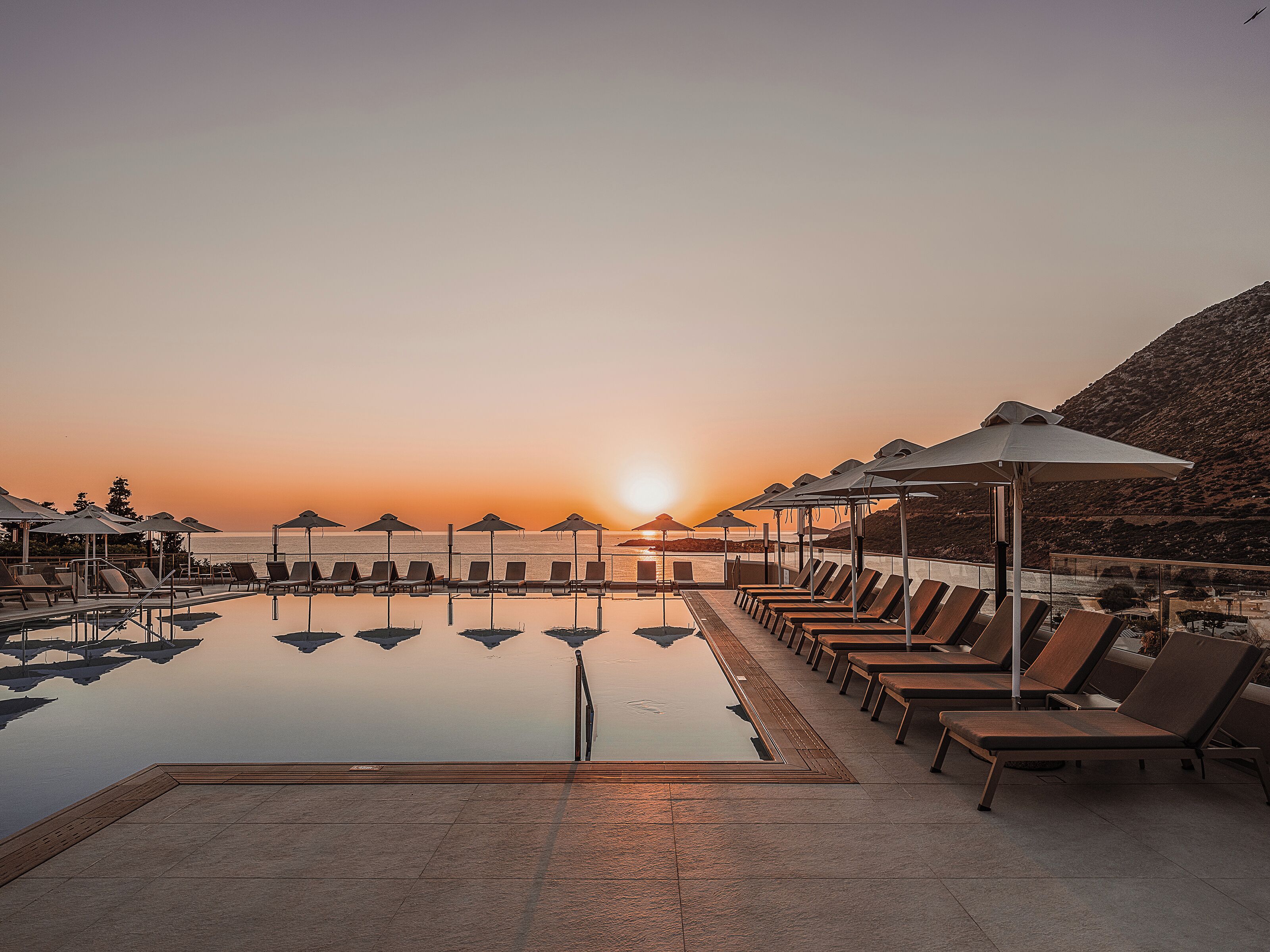 2 outdoor pools, open 8:00 AM to 6:00 PM, pool umbrellas, sun loungers