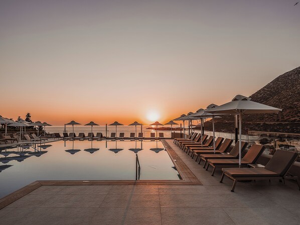 2 outdoor pools, open 8:00 AM to 6:00 PM, pool umbrellas, sun loungers