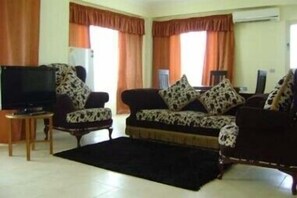 Double Room | Living area | Flat-screen TV - Aqua Hotel Resort & Spa (Sharm El Sheikh)