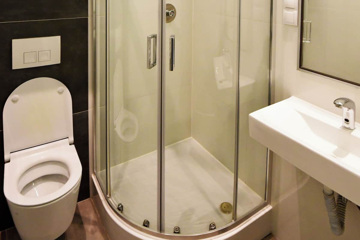 Shower, rainfall showerhead, towels, soap