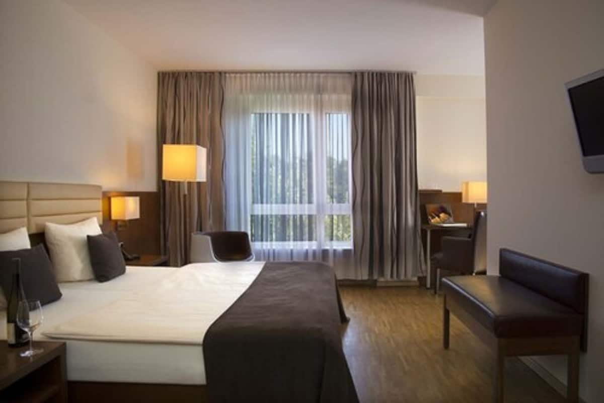 Hypoallergeen beddengoed, een gratis minibar, een bureau