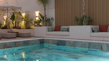 Outdoor pool, pool umbrellas, pool loungers