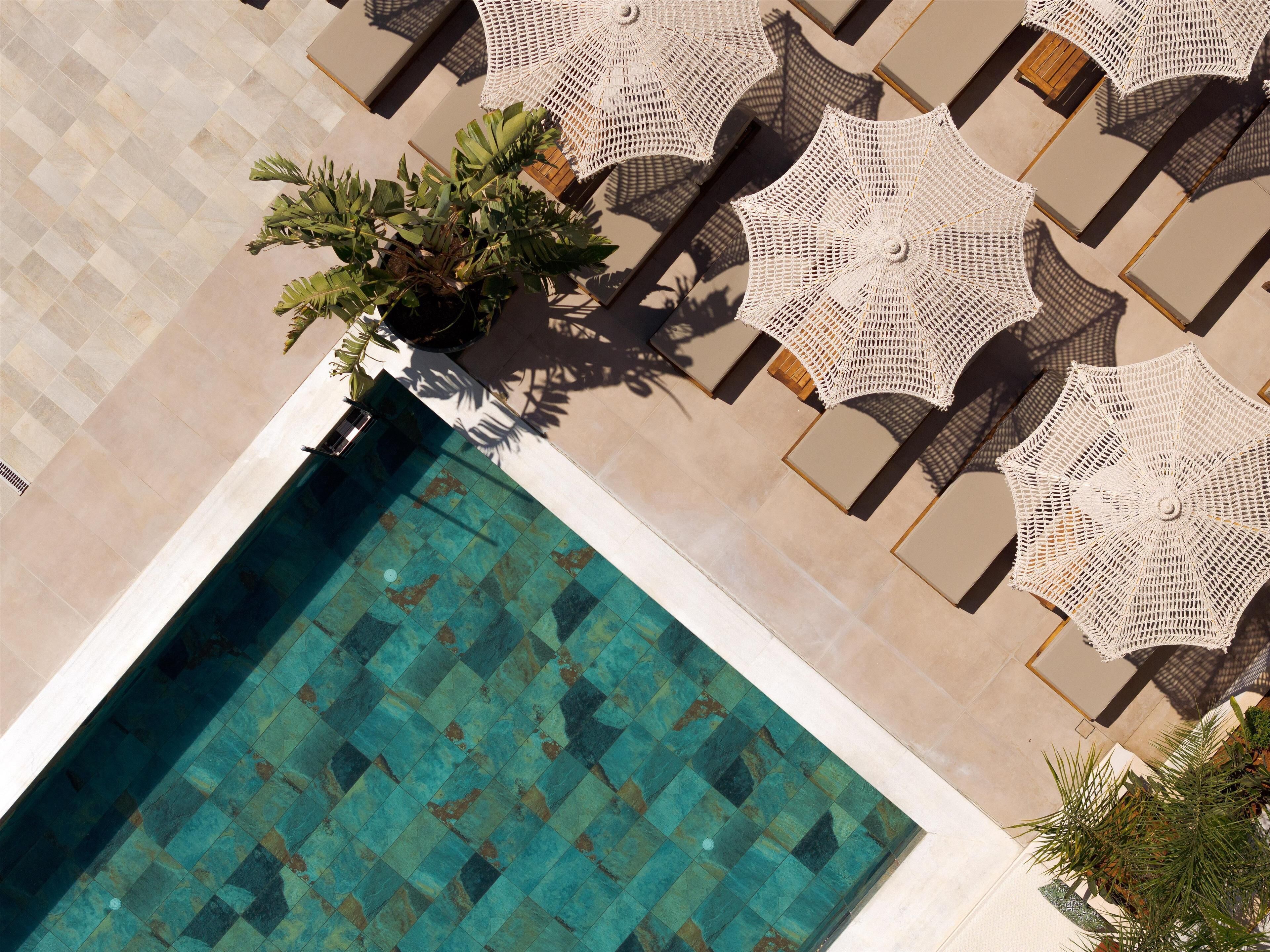 outdoor pool, pool umbrellas, pool loungers