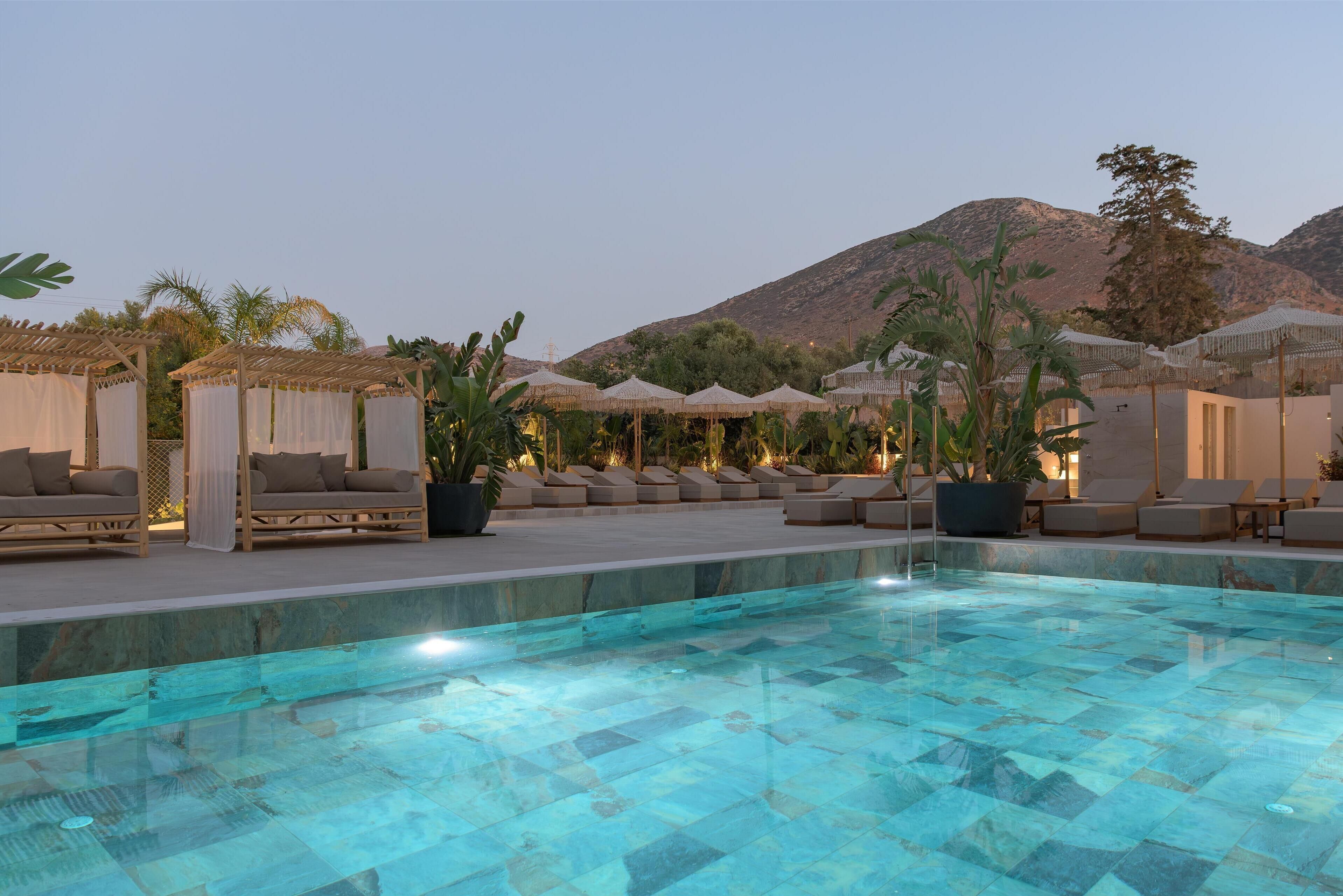 outdoor pool, pool umbrellas, pool loungers