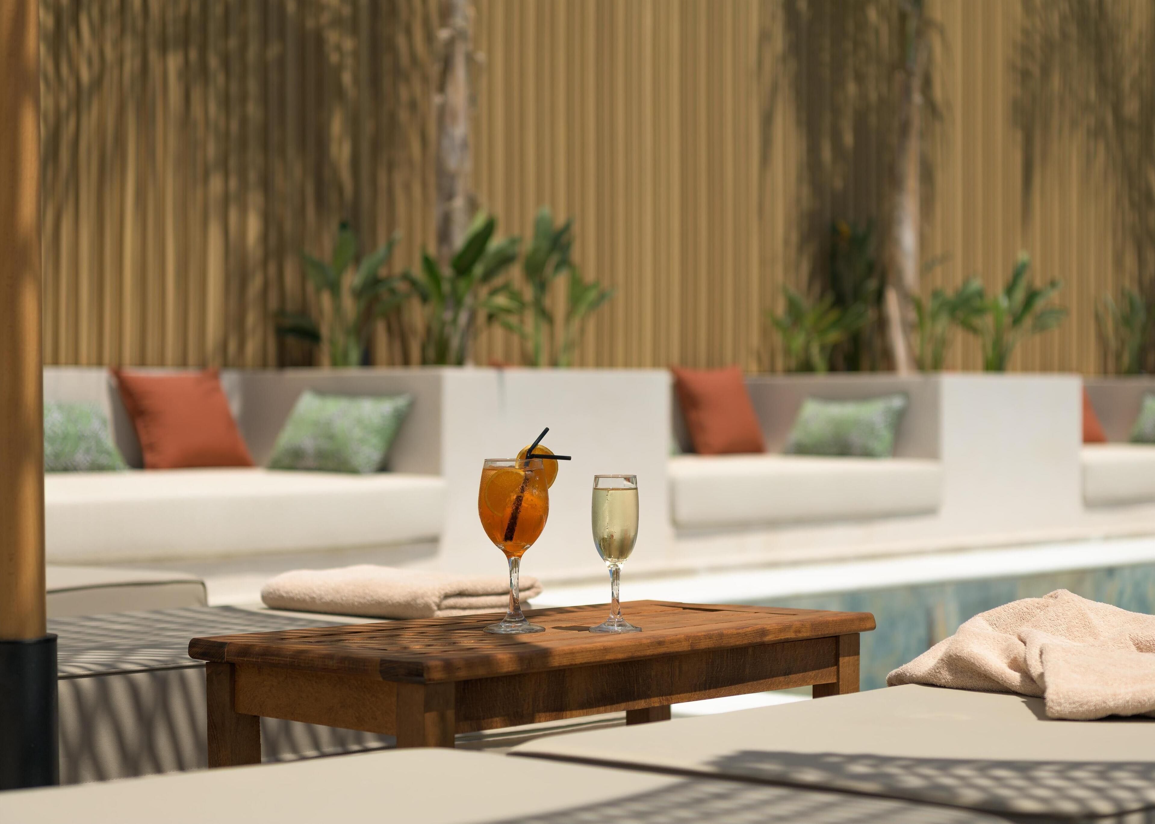 outdoor pool, pool umbrellas, pool loungers